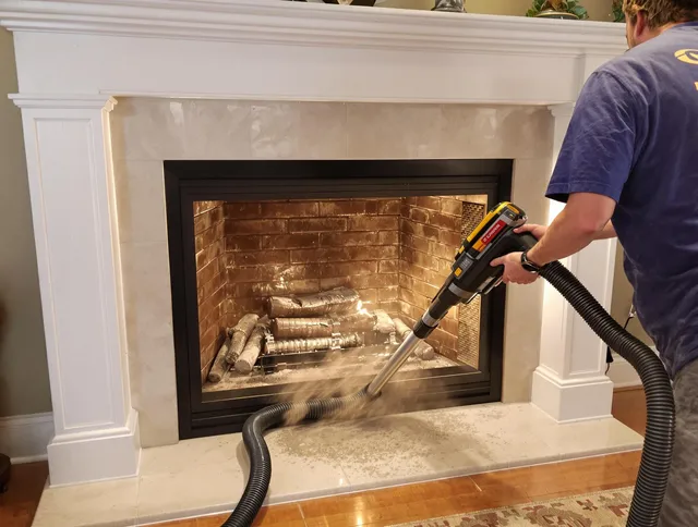 Fireplace cleaning performed by Concord Chimney Sweep in Concord, NC