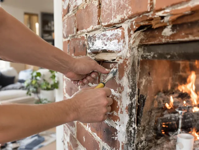 Routine fireplace repair by Concord Chimney Sweep in Concord, NC